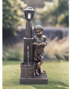 Boy Reading at Lamp Water Feature