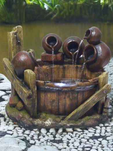 Pouring Pots on Barrel Water Feature