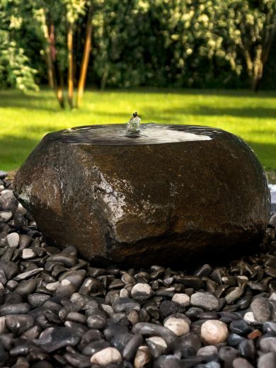 Babbling Natural Boulder Water Feature. A natural Granite stone.