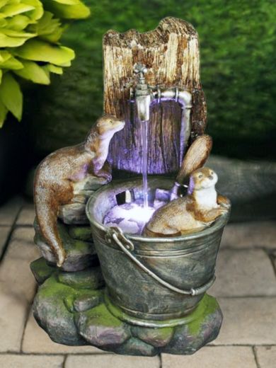 2 Otters at Tap Water Feature